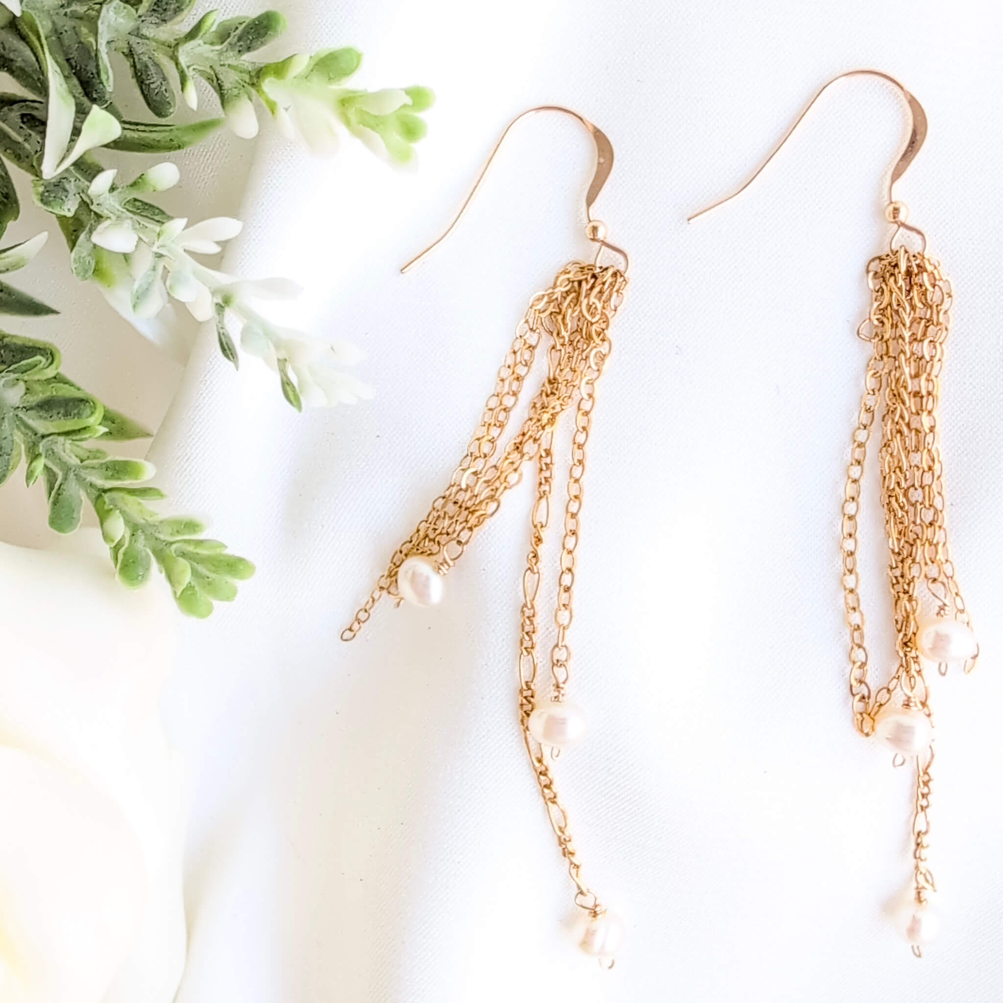 Gold chain earrings with pearls