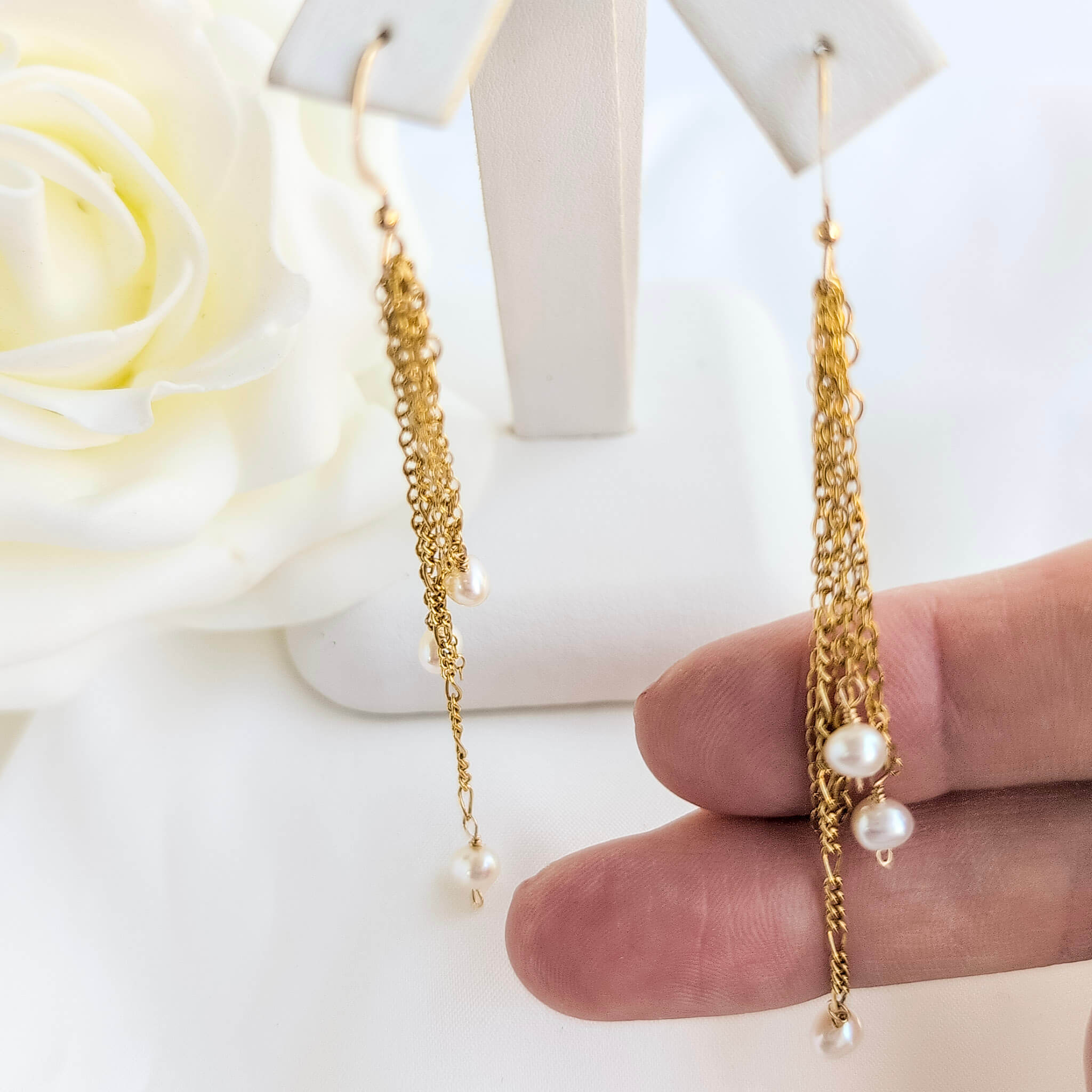 Gold chain earrings with pearls