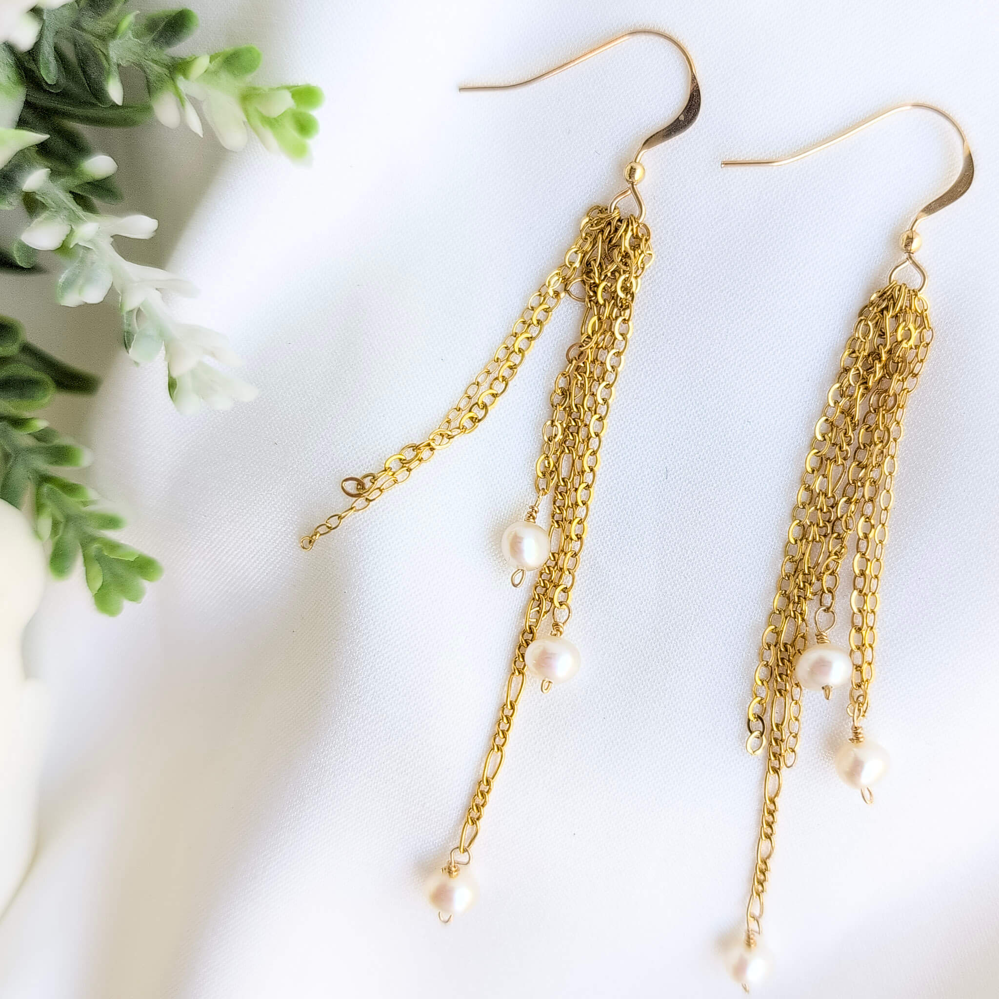 Gold chain earrings with pearls