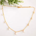 Gold chain necklace with pearls drops