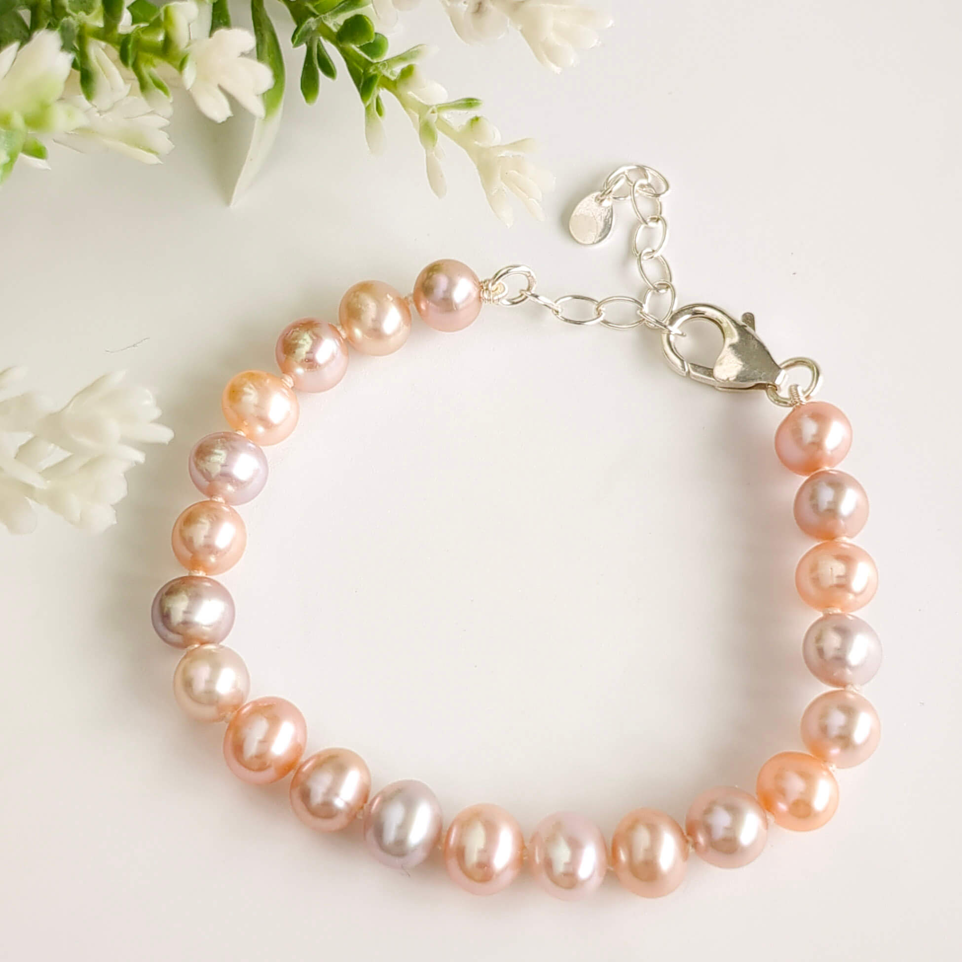 Pearl bracelet with pink, lilac and peach pearls