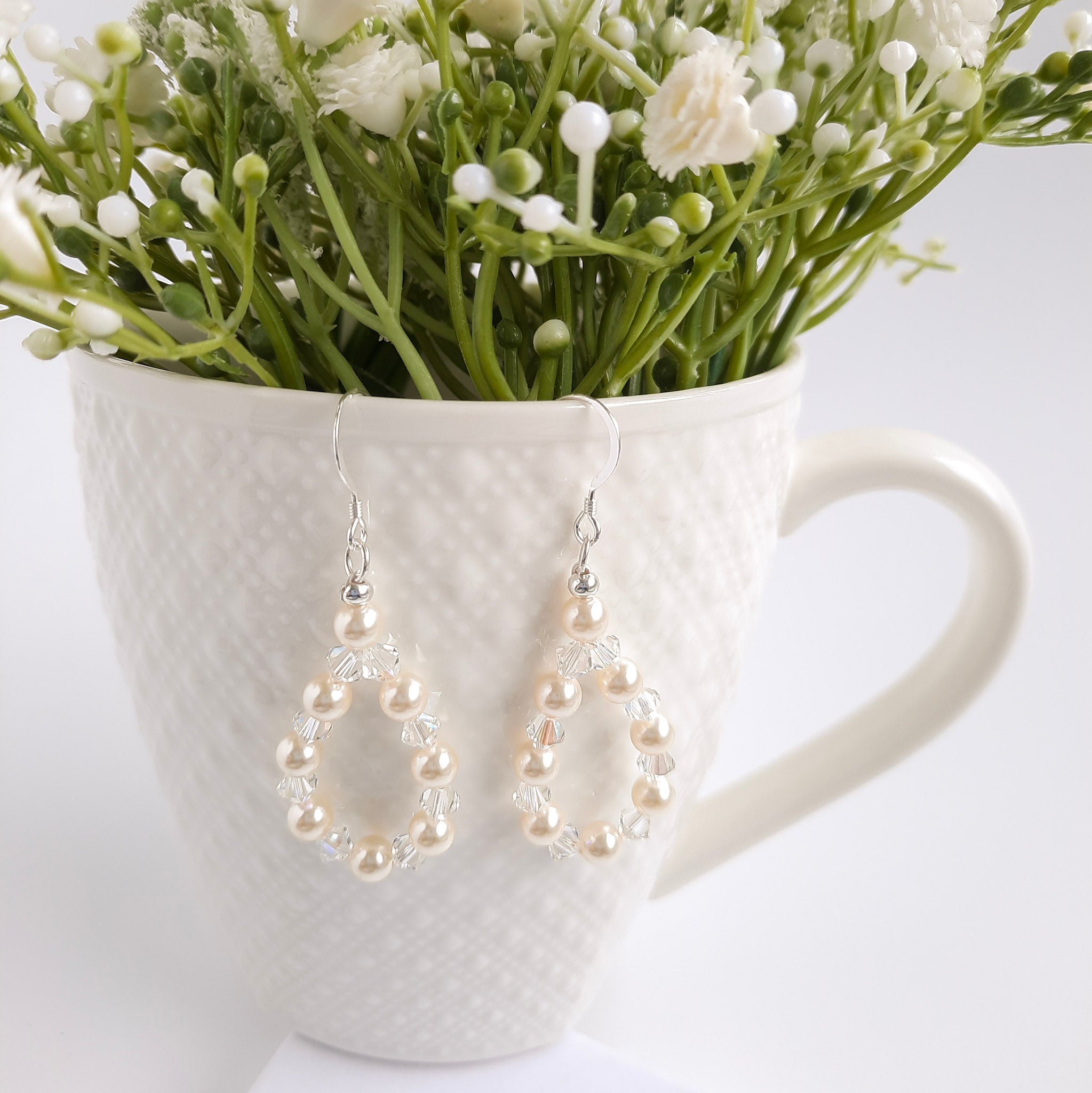 Teardrop shaped pearl earrings