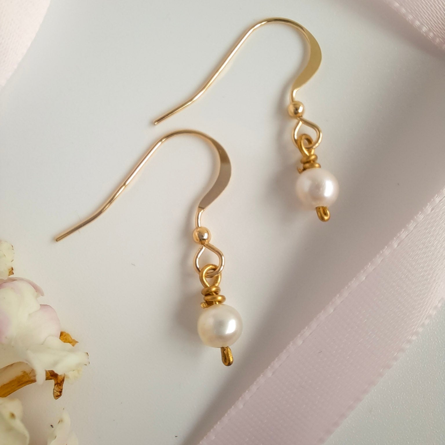 Small Pearl Drop Earrings in gold