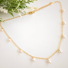 Gold chain necklace with pearl drops