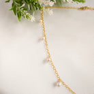 Gold chain necklace with pearl drops