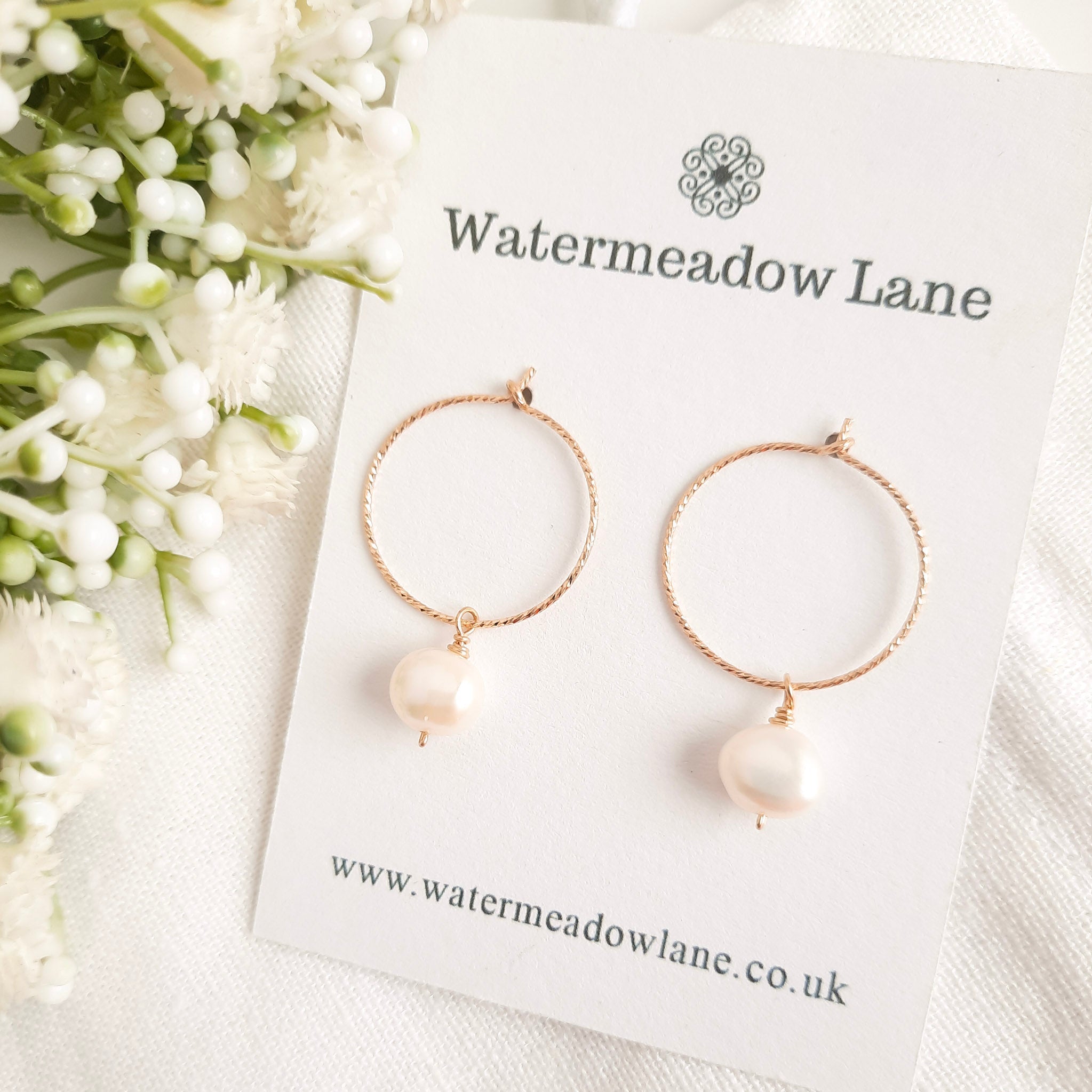 Gold hoop pearl earrings