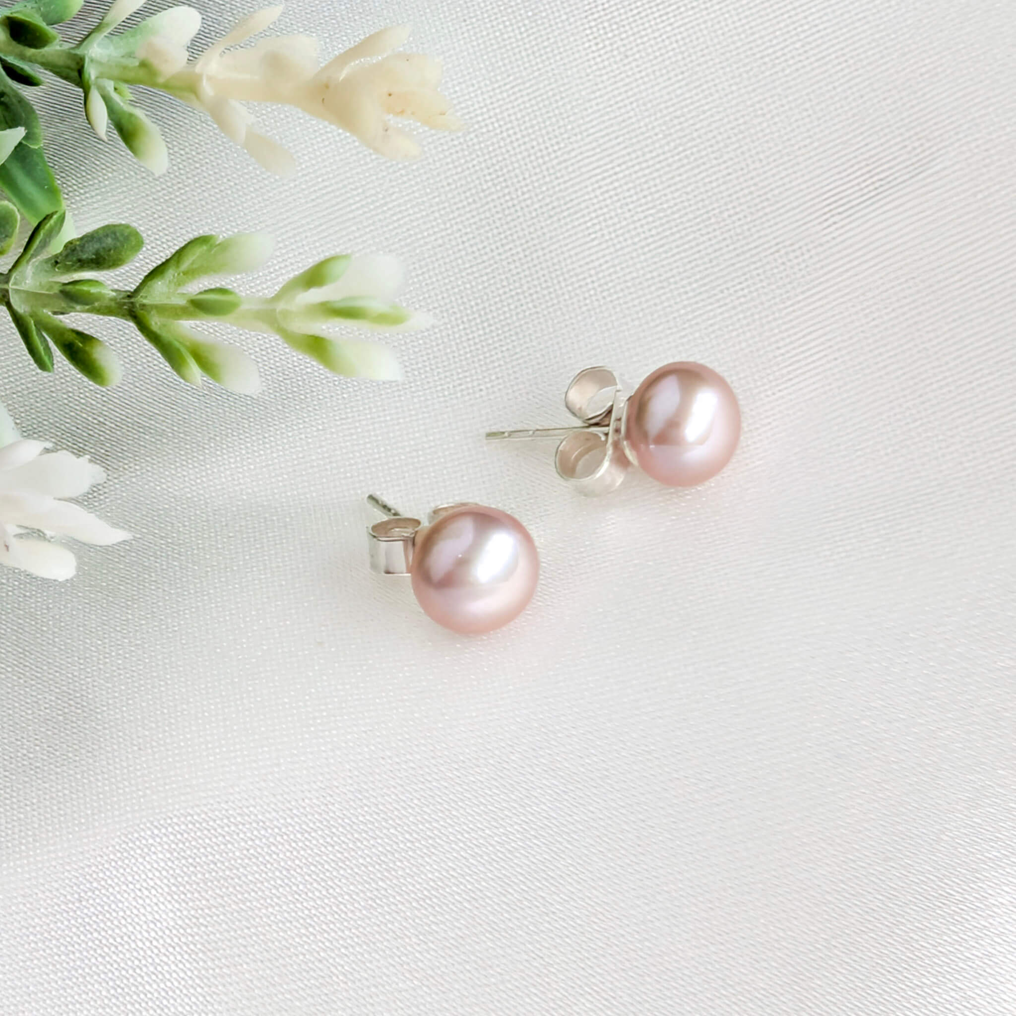 pink pearl stud earrings