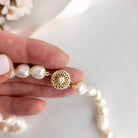 Baroque pearl necklace with gold clasp