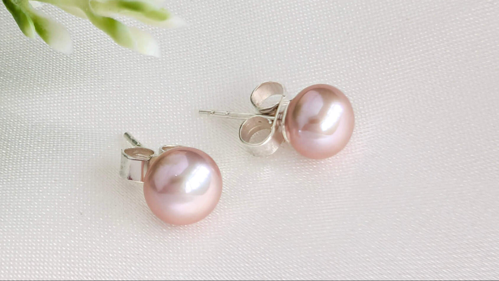 Pink pearl stud earrings