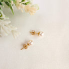 medium sized pearl stud earrings in gold