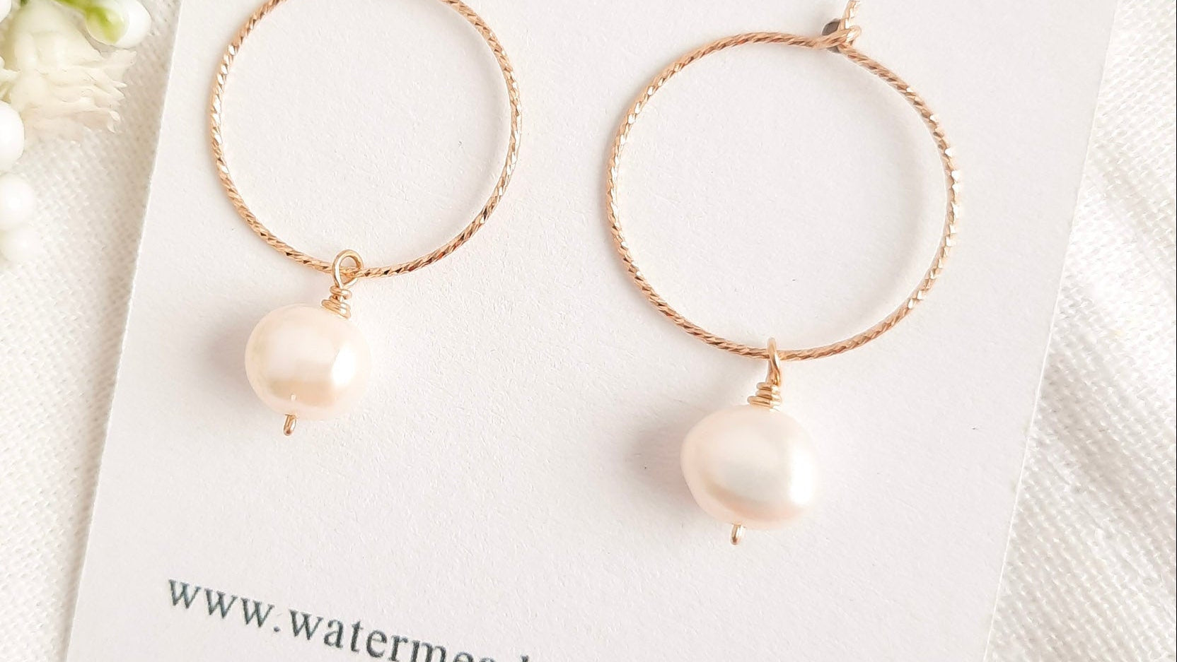 Gold hoop pearl earrings