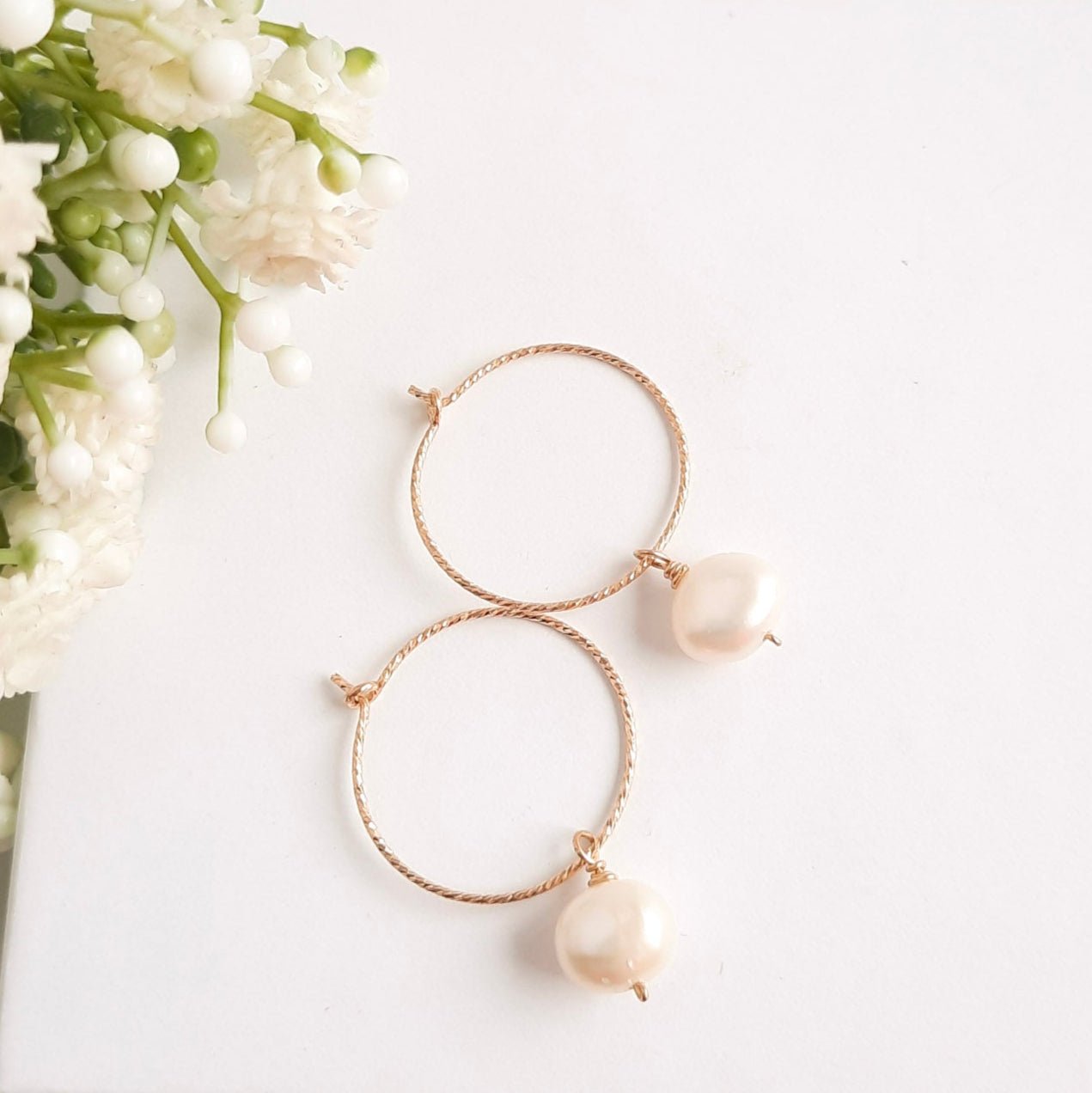 Gold hoop pearl earrings 